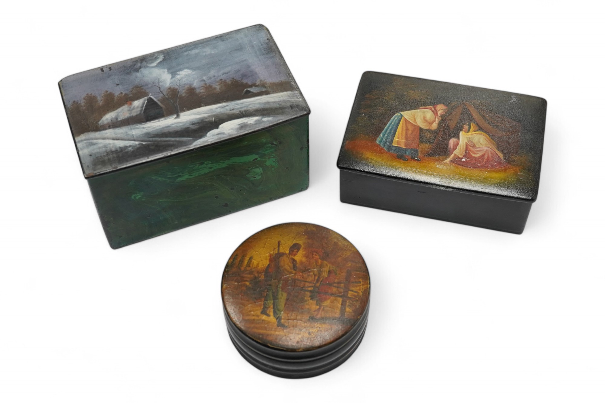 Three late 19th/early 20th century Russian lacquer boxes, largest 14cm. Condition - fair to good